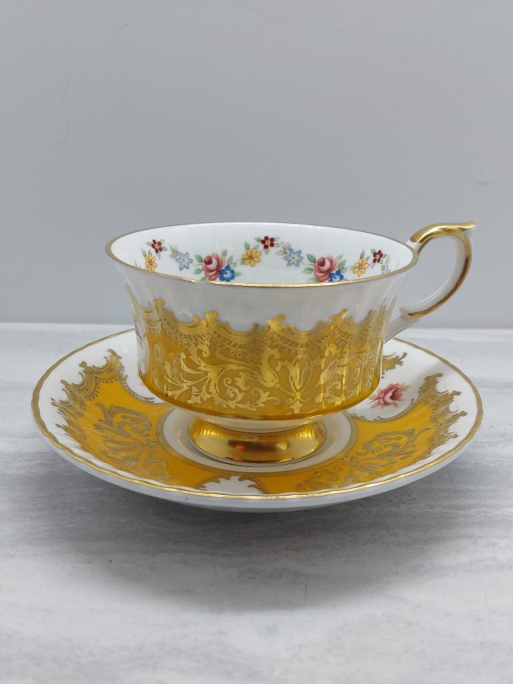 Vintage Paragon Yellow Gold Trenton Footed Tea cup & Saucer Set